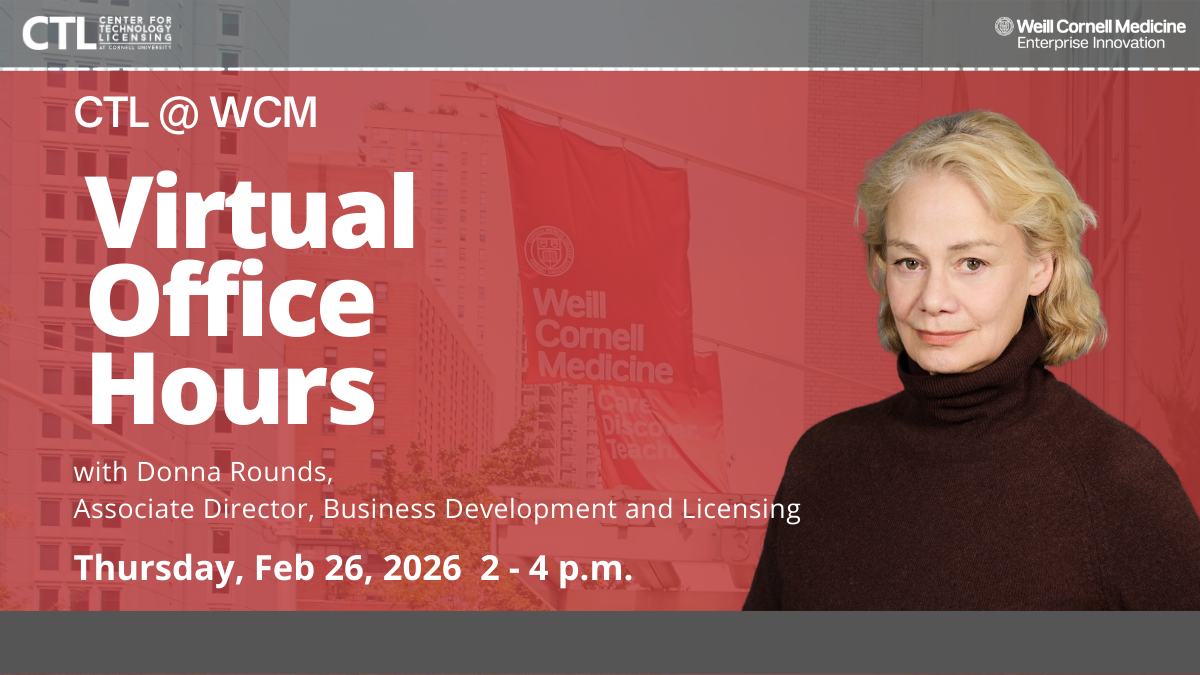 Caucasian woman with short curly blonde hair and wearing a dark brown turtleneck