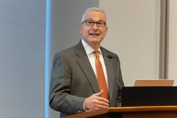 Ashley Jones a man speaking at a podium