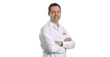 Dr. Olivier Elemento A Caucasian man in white coat